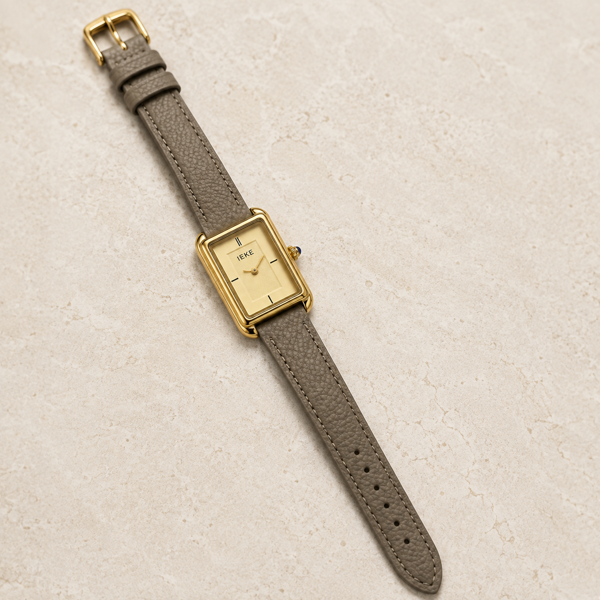 Montre Éclat Rectangulaire Dorée – Bracelet Taupe & Cadran Champagne