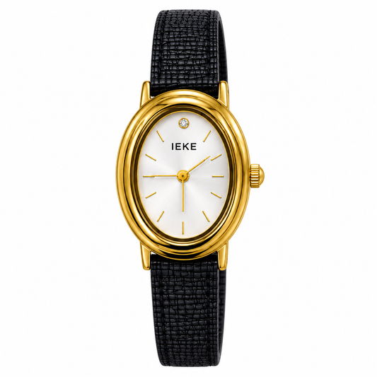 Montre ovale dorée à bracelet noir fermé, cadran ivoire sur fond blanc
